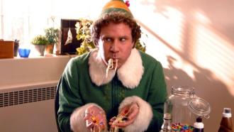 will ferrell in elf being a little scamp eating spaghetti